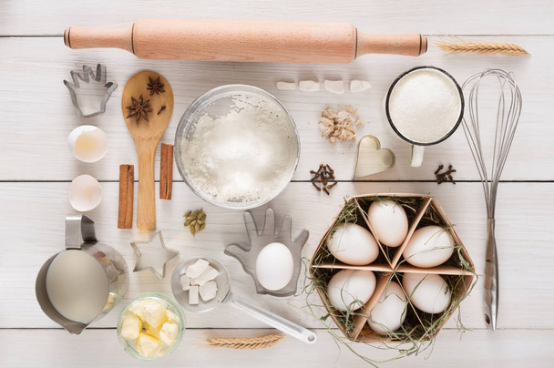 Baking flat lay ingredients on white rustic wood background - Fotografie, Obrázek