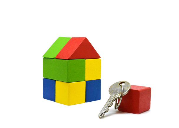 Close up van home model en sleutel. Hypotheek concept. - Foto, afbeelding