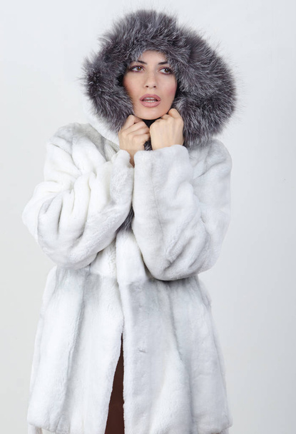 girl in a white fur coat - 写真・画像