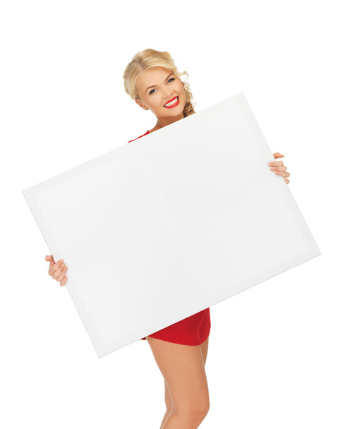 Lovely woman in red dress with blank board - Фото, зображення