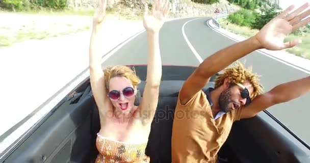  woman and man riding in convertible - Footage, Video