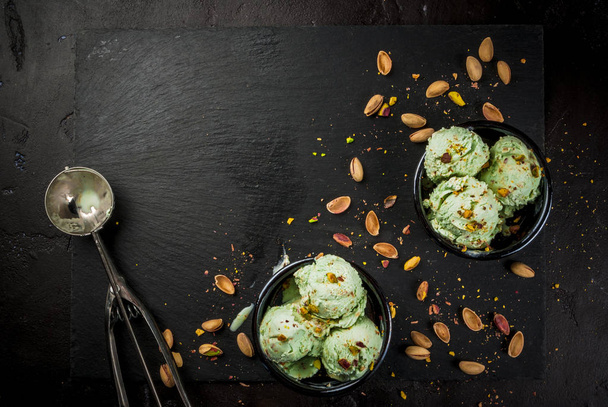 Pistachio ice cream sprinkled with nuts - Photo, Image
