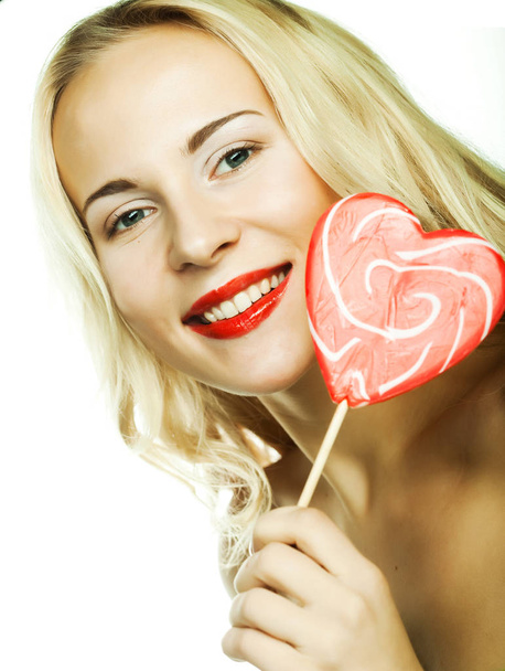 woman with heart lolly pop - Φωτογραφία, εικόνα