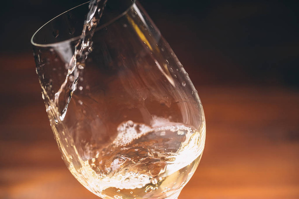 Pouring white wine - Photo, Image