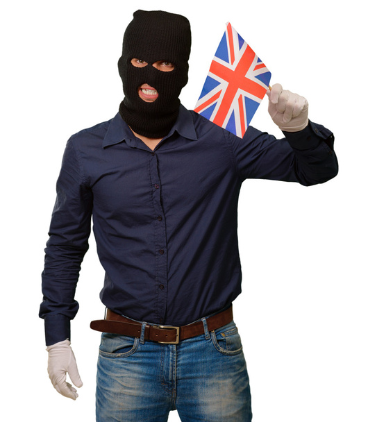 bir bayrak tutan maskeli bir adam portresi - Fotoğraf, Görsel