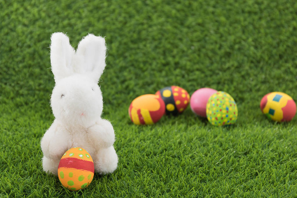 Easter bunny toy and Easter eggs - Photo, Image