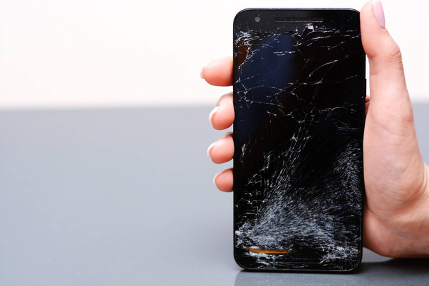 Broken glass or cracked smartphone display  - Photo, Image