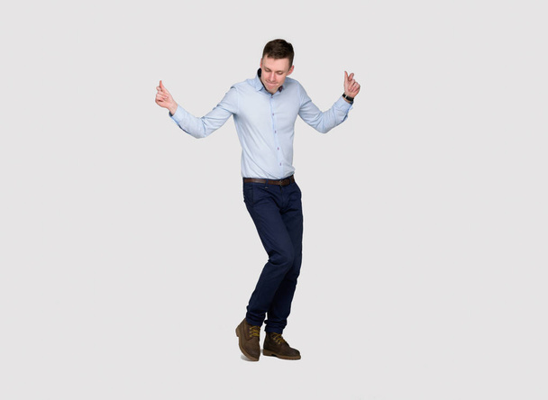 Modern Young Man Rejoicing Success Isolated on White Background - Fotoğraf, Görsel