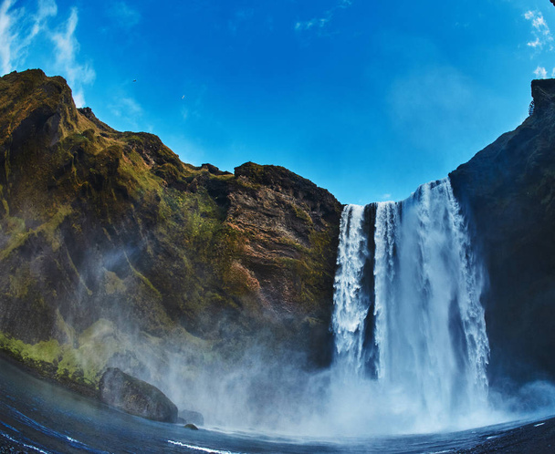famous Skogarfoss waterfall in southern Iceland - Fotoğraf, Görsel