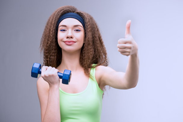 sporty woman with dumbbell - Foto, Bild