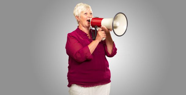 Portrait Of A Senior Woman With Megaphone - Фото, зображення
