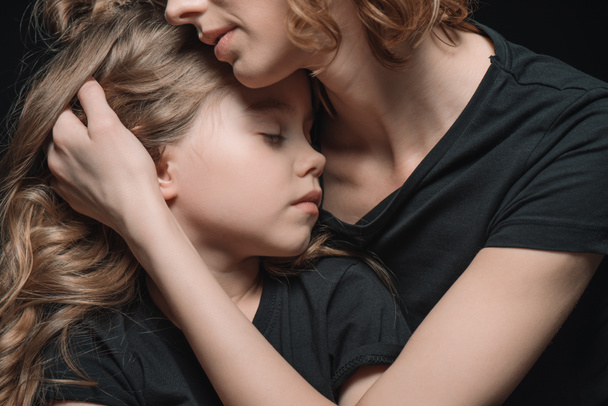 daughter and mother hugging - Photo, Image