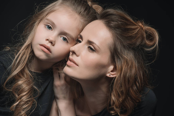 stylish daughter and mother  - Фото, зображення