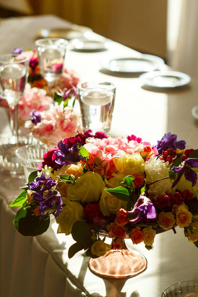 Beautiful Composition with flowers on the wedding table - Photo, Image