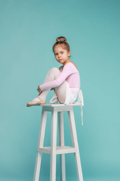 The little balerina dancer on blue background - Foto, immagini