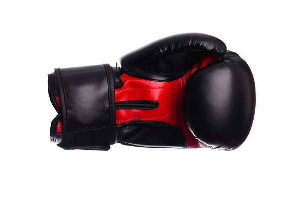 uno negro guantes de boxeo sobre un fondo blanco
 - Foto, imagen