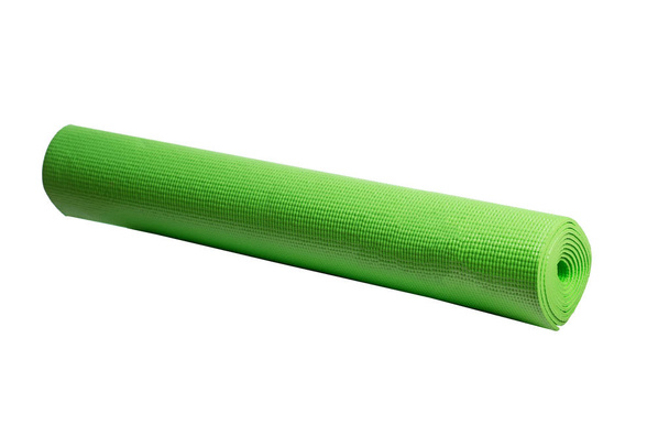 green yoga mat on a white background - Photo, Image