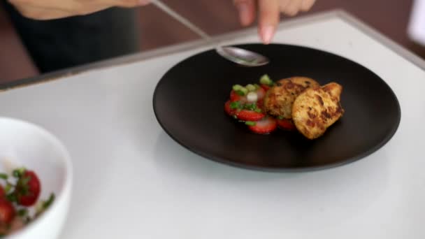 Plating with grilled chicken and strawberry on dish - Footage, Video