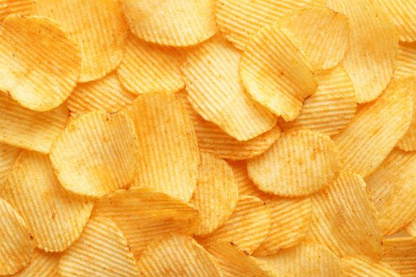 background corrugated golden chips with texture - Foto, Imagen