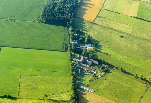 aerial view of green fields and farm house - Photo, Image