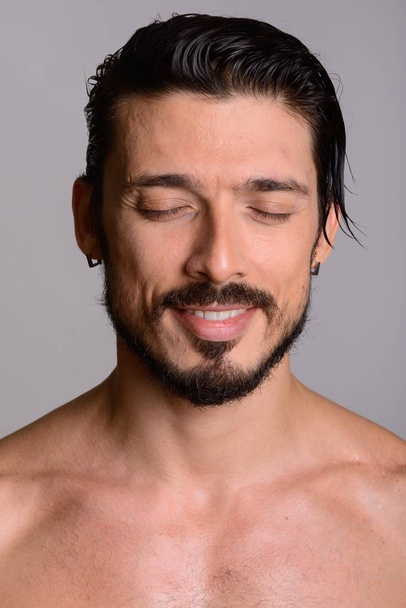Face of happy handsome man smiling with eyes closed shirtless - Photo, Image