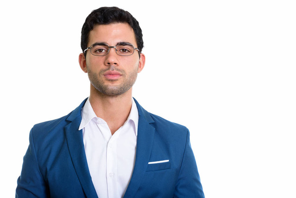 Estudio de un joven guapo empresario hispano con anteojos - Foto, Imagen