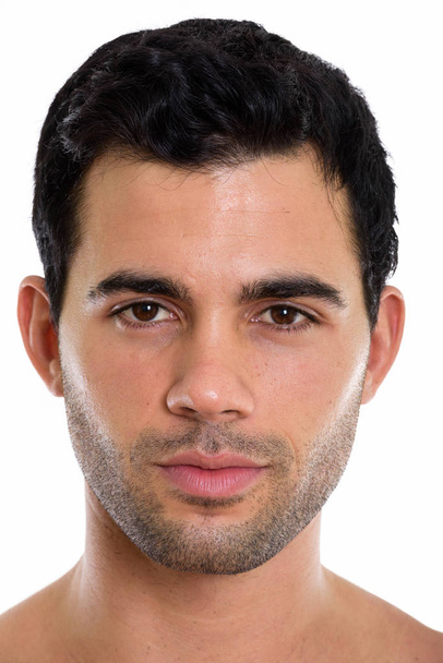 Face of young handsome Hispanic man - Photo, image