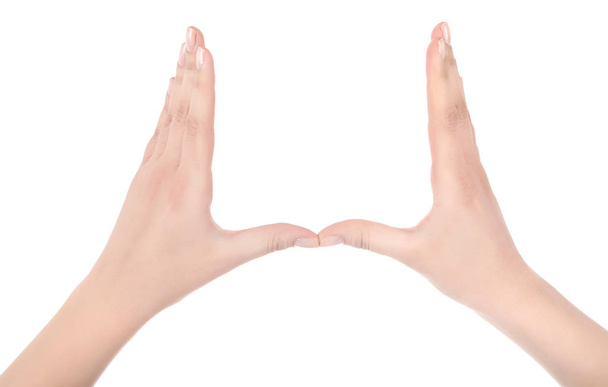 Primer plano de la mano de una hermosa mujer, con la palma en alto. Aislado sobre blanco b
 - Foto, Imagen