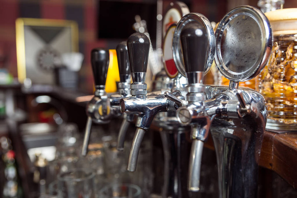 Close-up of the beer pipes - Foto, imagen