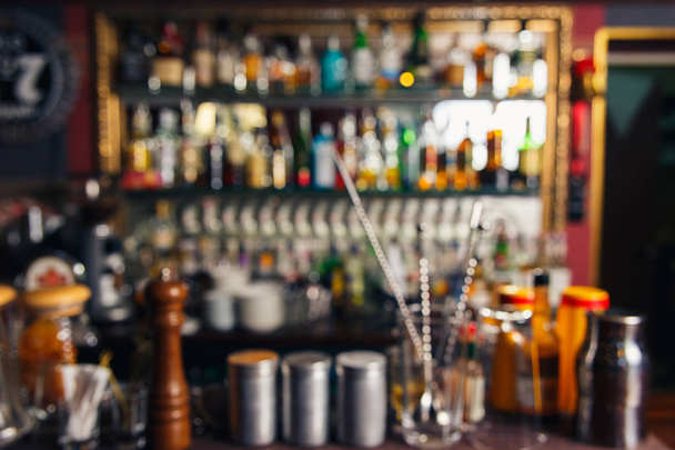 Blurred background of bartender tools on bar - 写真・画像
