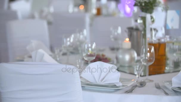 table decorated with flowers and candles - Footage, Video