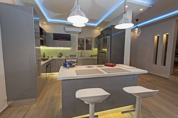 Modern kitchen in a luxury apartment - Fotoğraf, Görsel
