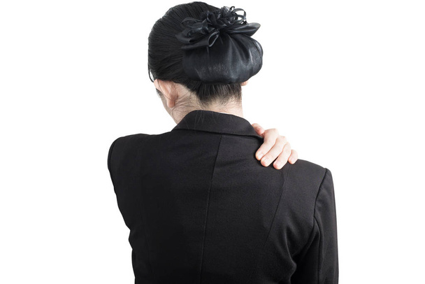 Painful shoulder in a businesswoman isolated on white background. Clipping path on white background. - Foto, imagen