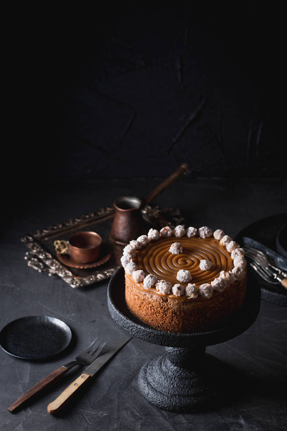 A birthday cake with salted caramel and hazelnuts. - Fotoğraf, Görsel