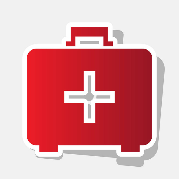 Orvosi Elsősegély doboz-jele. Vektor. Új év vöröses ikon-val külső körvonal és szürke árnyék, világos szürke háttér. - Vektor, kép