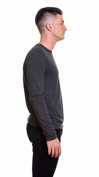 Profile view of young handsome man standing  - Photo, Image
