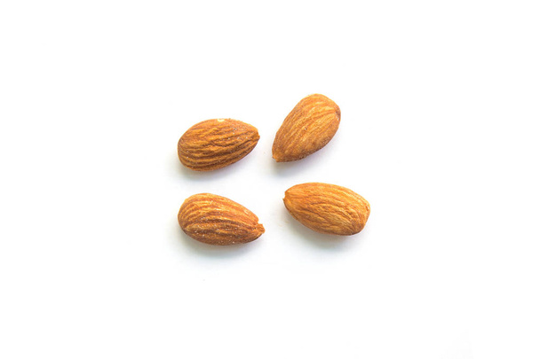 Almonds isolated on white background. - Fotografie, Obrázek