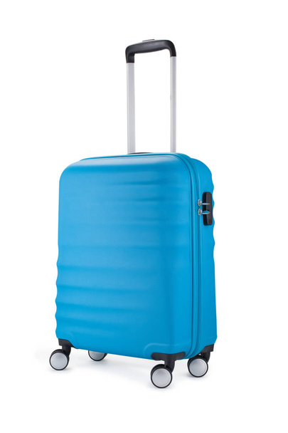 blue suitcase for travel isolated on white background. - Фото, изображение