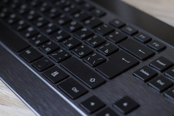 Computer keyboard isolated on grey background. - Fotó, kép