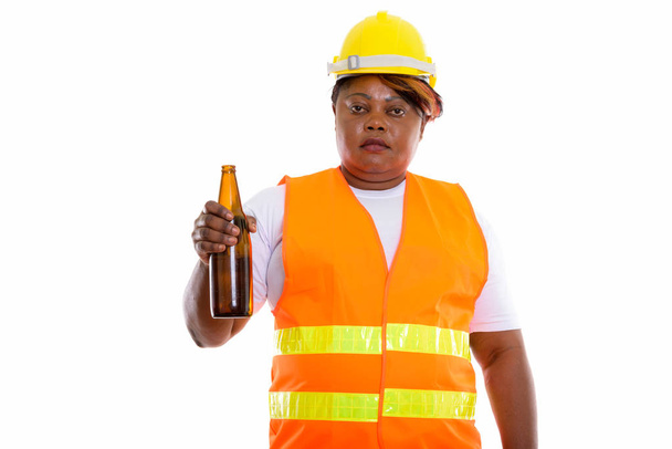Estudio disparo de grasa negro mujer africana trabajador de la construcción holdi
 - Foto, imagen