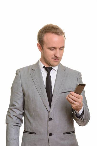 Красивий кавказьких бізнесмен проведення мобільного телефону - Фото, зображення
