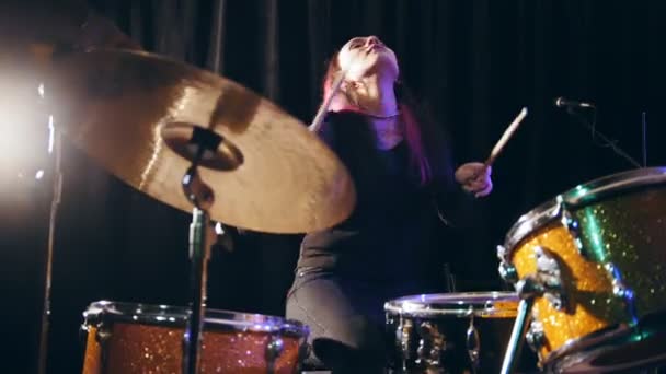 Teen rock music - Passionate dashing girl percussion drummer perform music break down - Video, Çekim