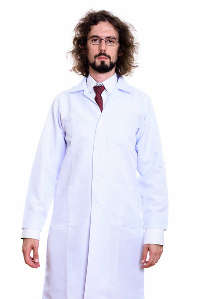 Studio shot of handsome man doctor standing  - Фото, изображение