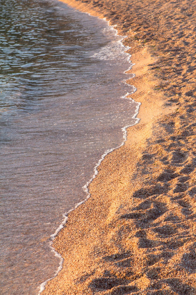 Soft wave of the sea on the sandy beach - Photo, Image