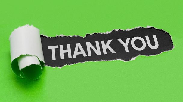 Разорванная зеленая бумага со словом "Спасибо".
 - Фото, изображение