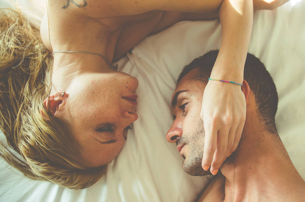 Young couple in bed - Photo, Image