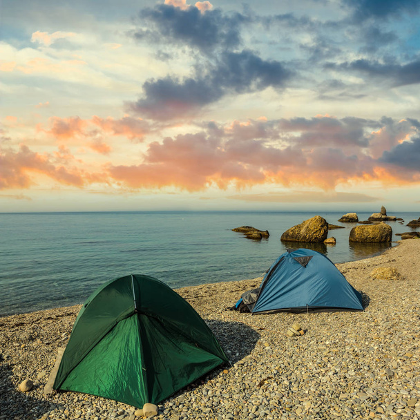 touristic camp on a sea coast at the evening - Foto, Bild