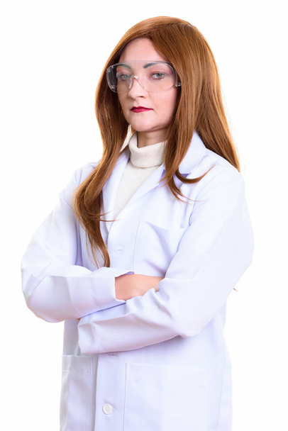Studio shot of woman doctor with arms crossed - Foto, imagen