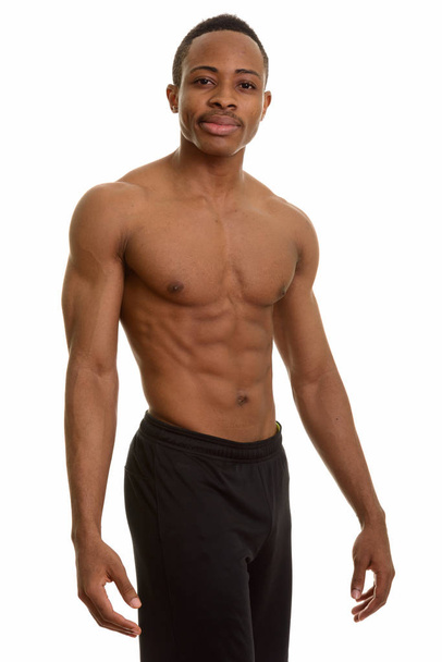 Young African man shirtless - 写真・画像