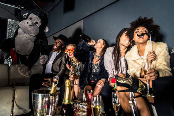 Friends having party in nightclub   - Fotografie, Obrázek